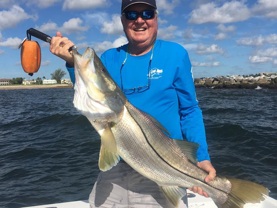 george lott with big inlet caught snook
