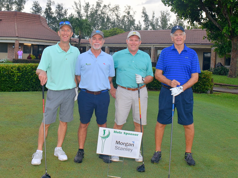 golfers at charity tournament